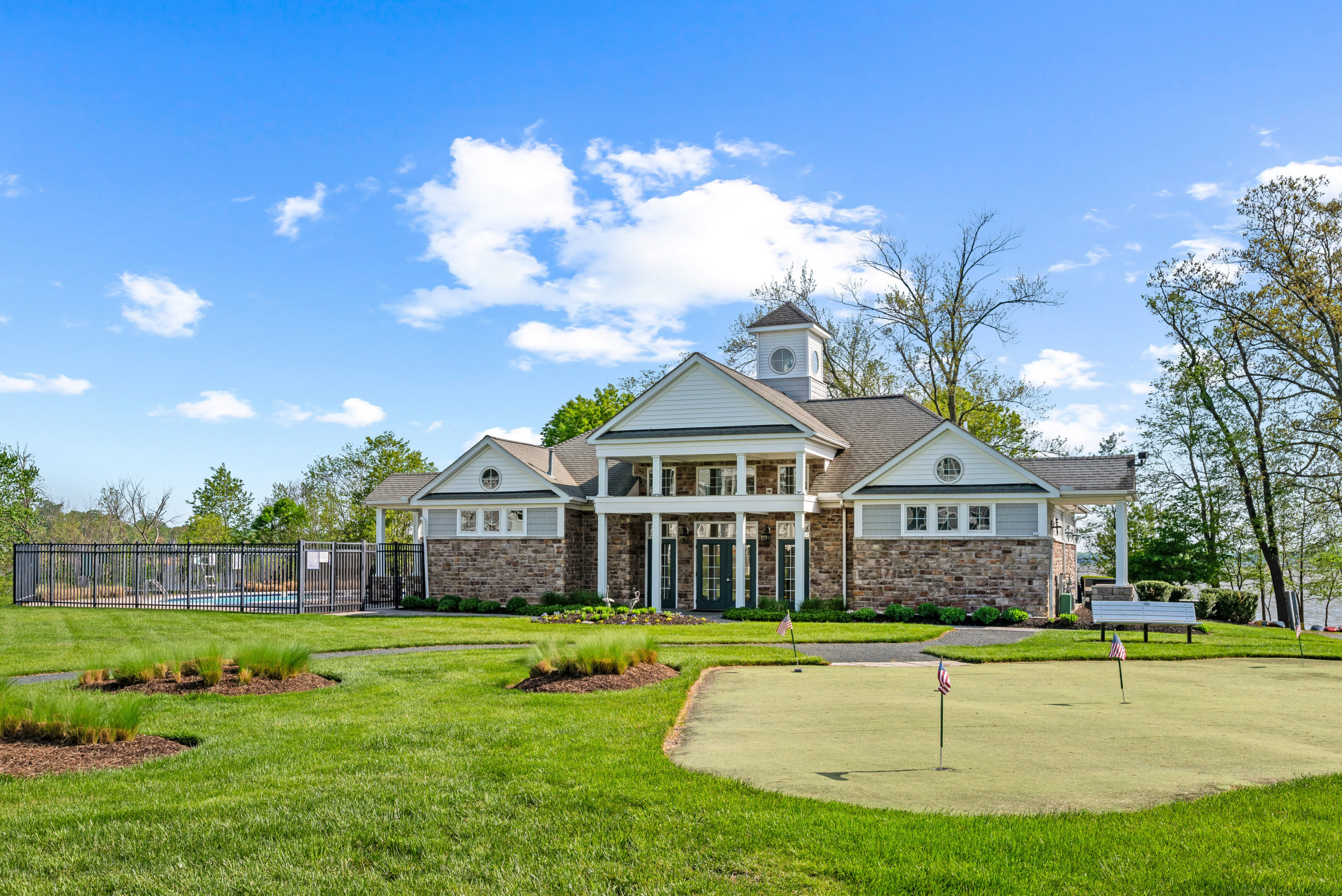 Clubhouse building with manicured lawn