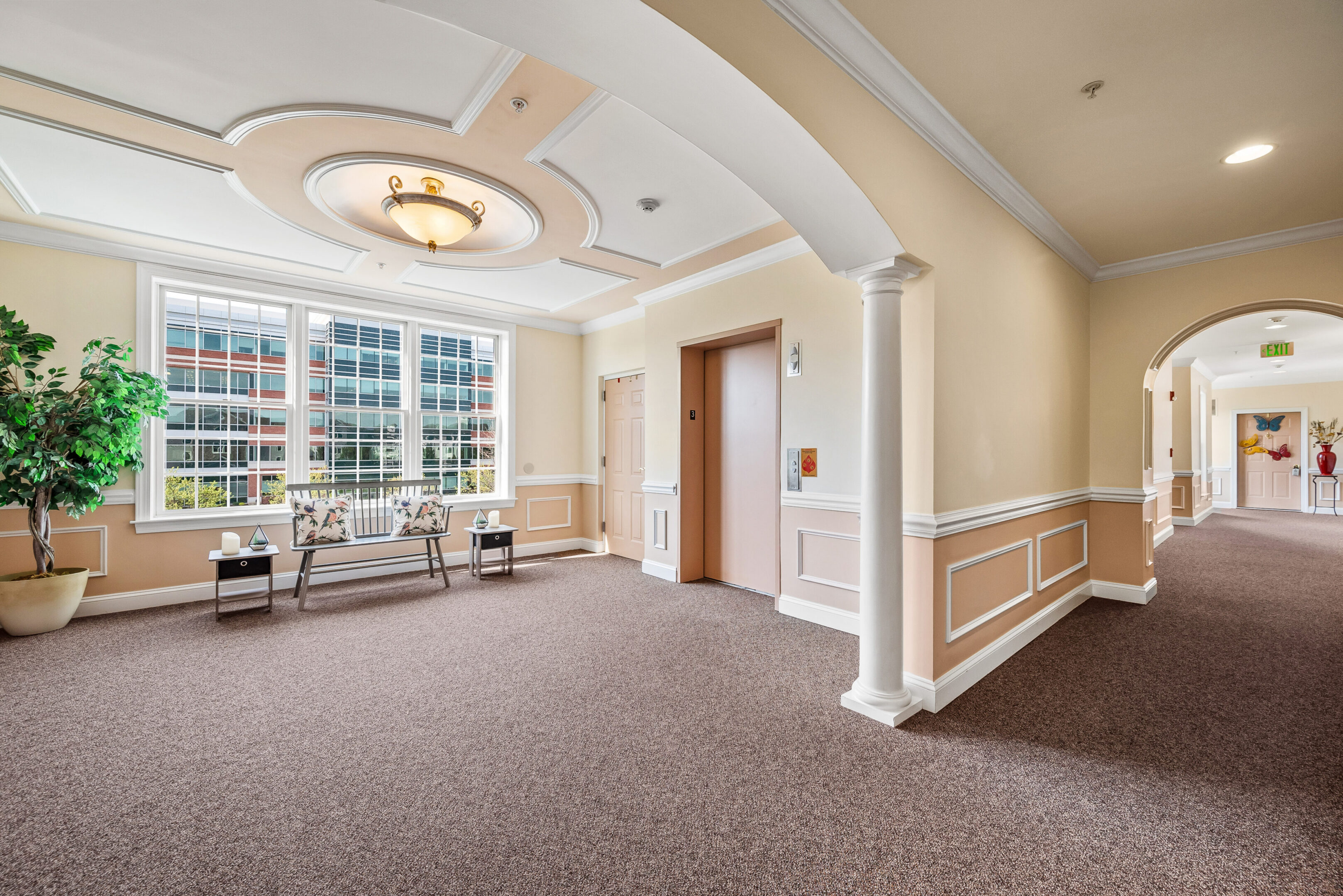Spacious hallway with decorative ceiling design