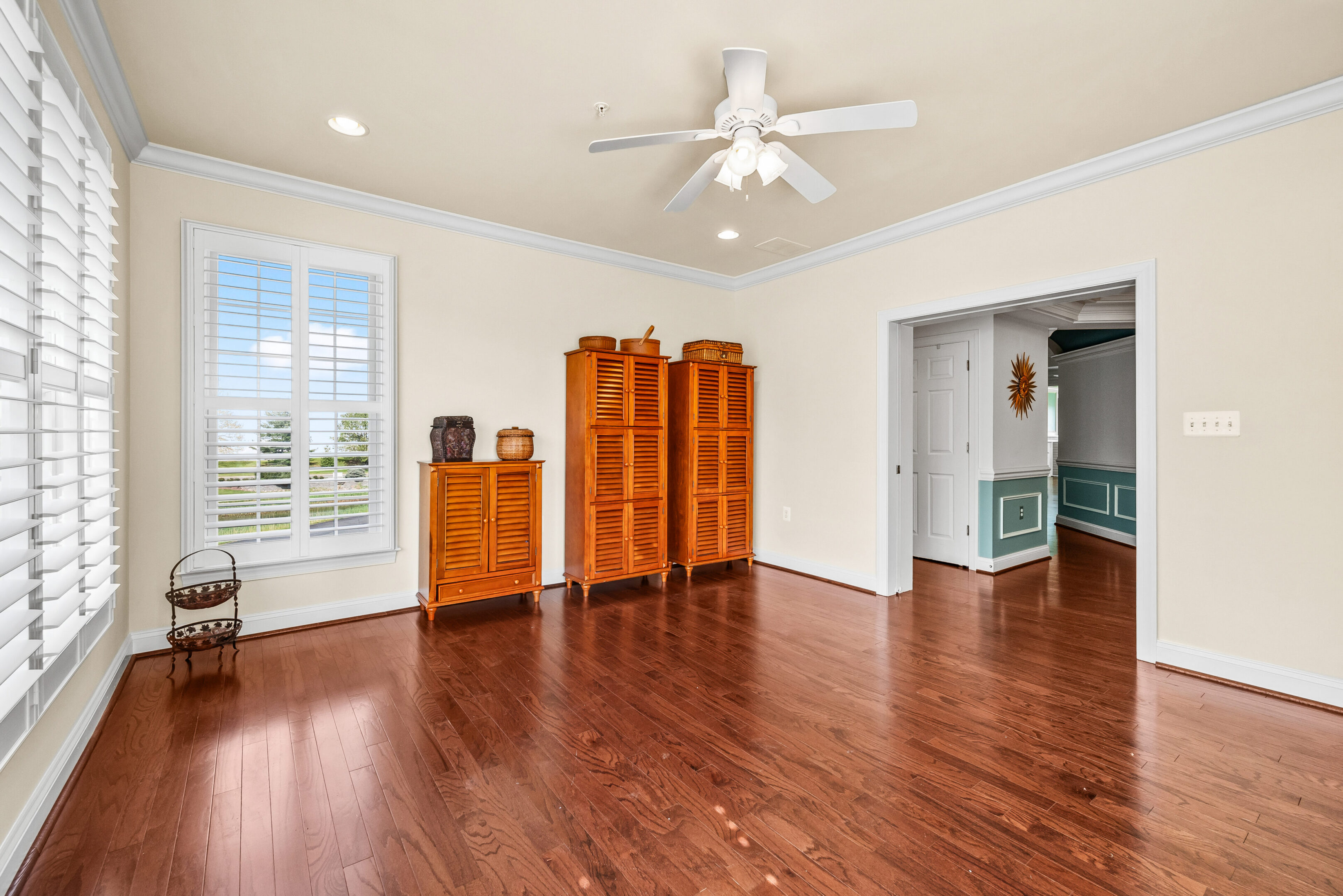 Sunlit room with shuttered windows