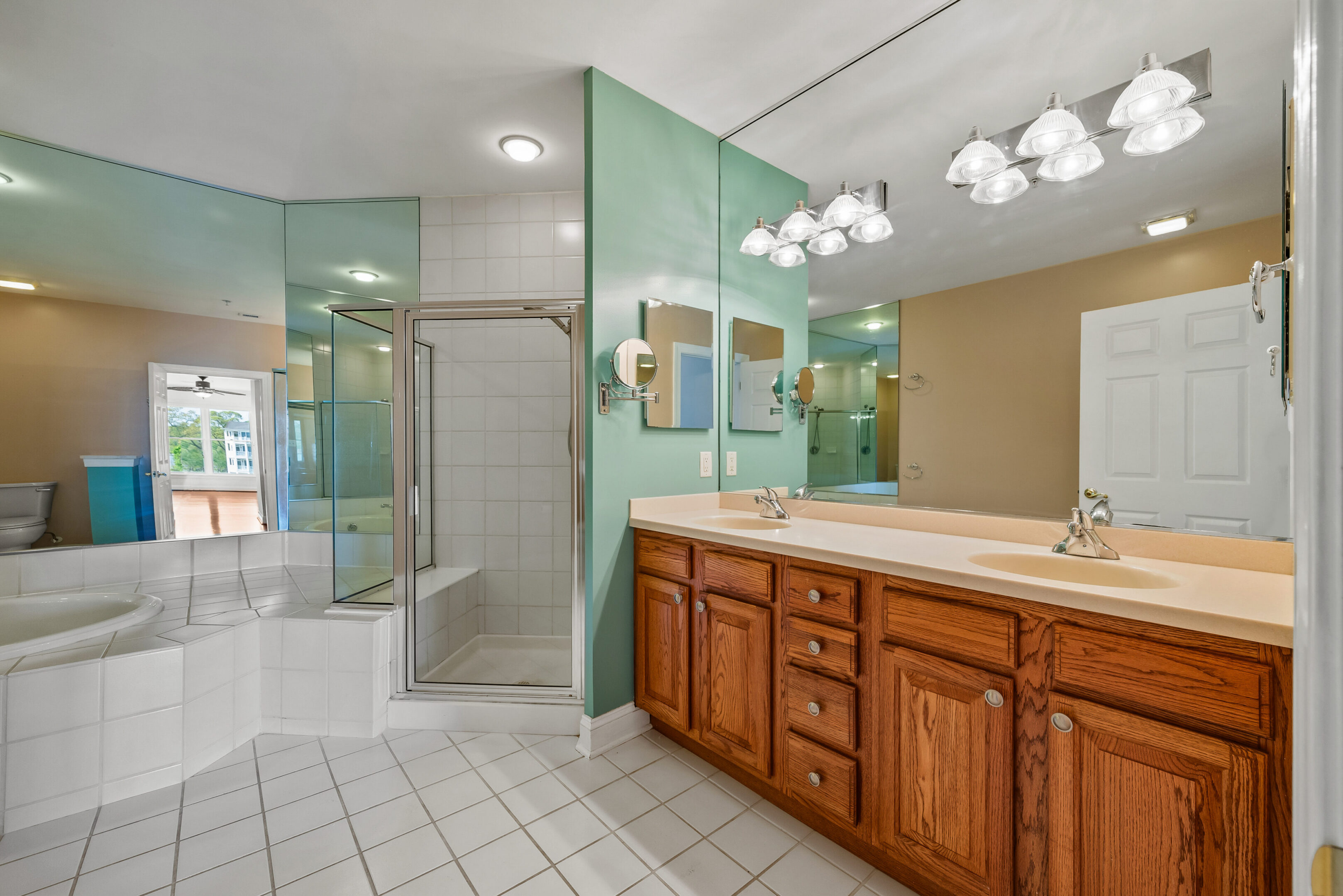 Modern bathroom with double vanity and shower