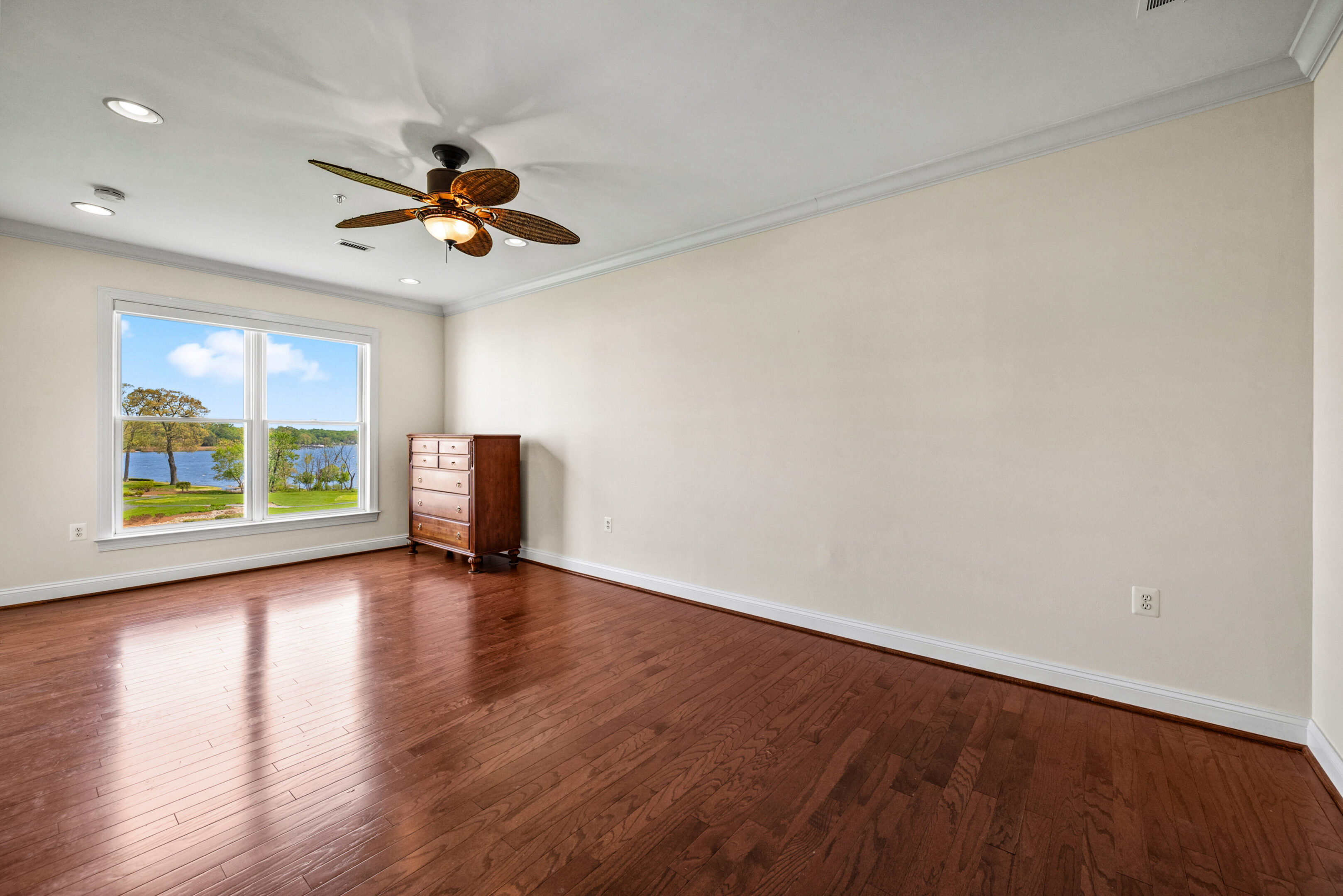 Bright room overlooking water scenery