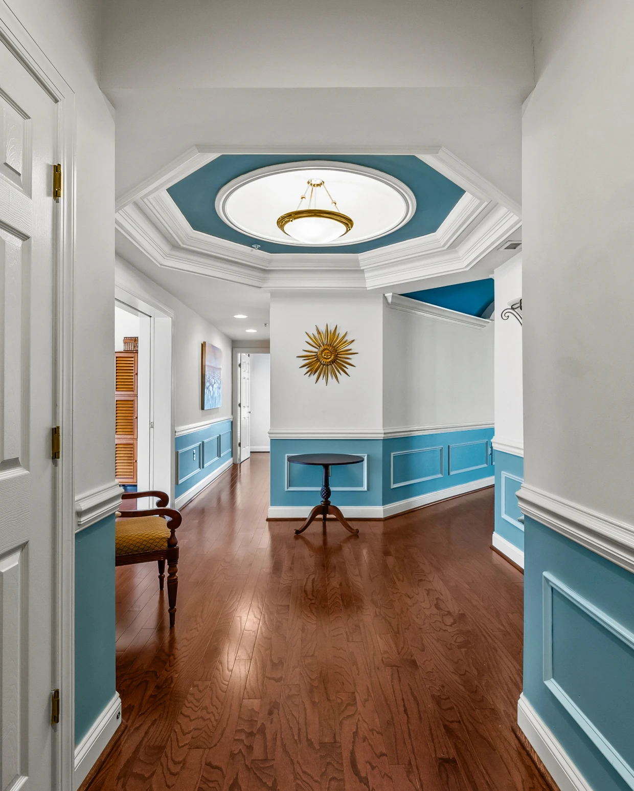 Elegant hallway with blue accents